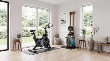 A beautiful, minimalist home layout showcasing an open-ecosystem smart magnetic bike and an upright vertical water rower resting cleanly on an equipment mat